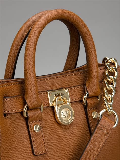 brown and tan michael kors purse|michael kors hand luggage.